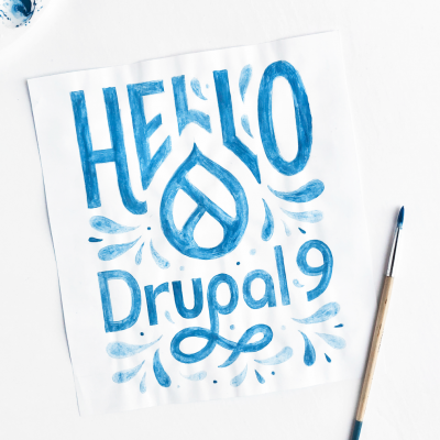Blue painted lettering with the words Hello Drupal 9 with raindrop design featuring the paint brush and palette. 